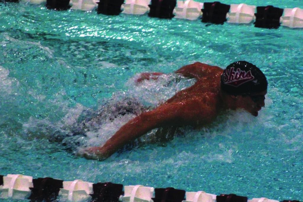 Swimmer races past competition