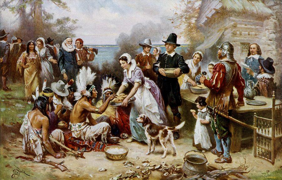 Colonists and Native Americans are depicted celebrating together, despite the holidays bloody origins. 