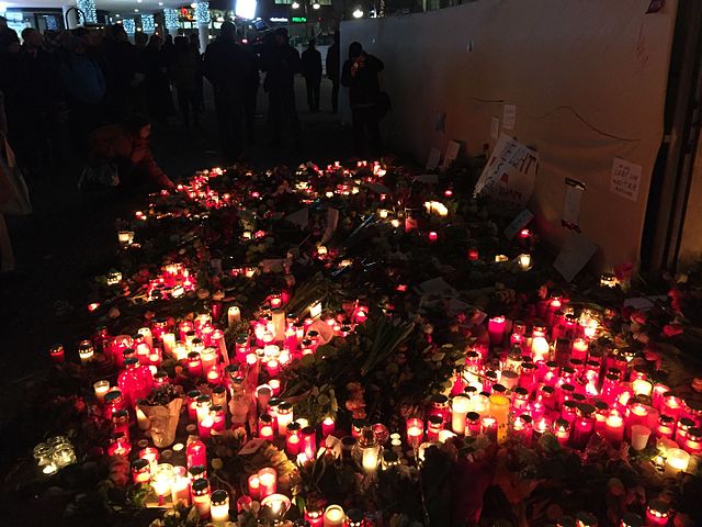 Germany mourned those lost in the Christmas market attack, holding vigils, as shown above.