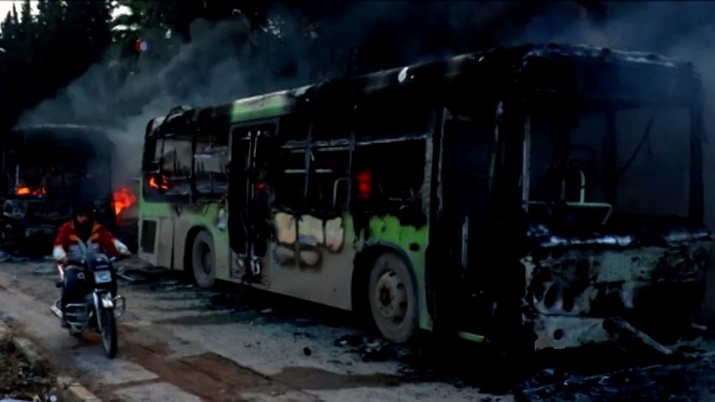 Burnt-out buses were meant to transport civilians and rebel fighters out of Aleppo.