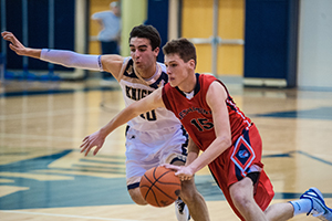 Junior Chris Arcidiacono dribbles past a defender in a game against West Chester Rustin High School.