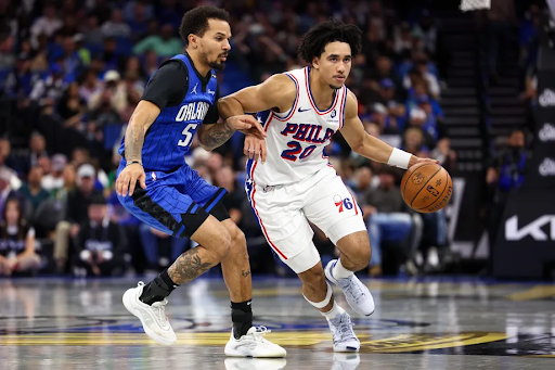 Jared McCain pushing past Orlando Magic defense in the Sixers vs. Magic game on Nov. 12, 2024

Nathan Ray Seebeck-Imagn Images
