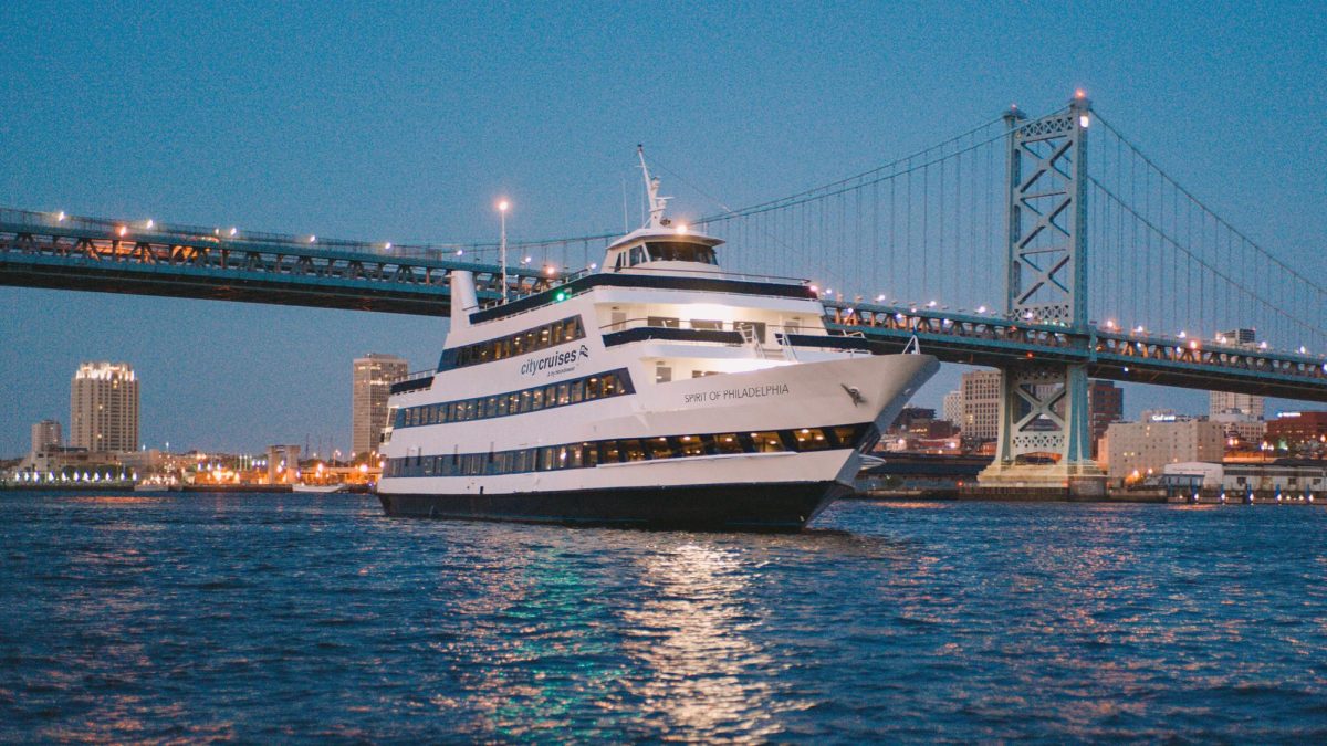 The Spirit of Philadelphia yacht cruising down the Delaware River via City Cruises (Visit Philadelphia)