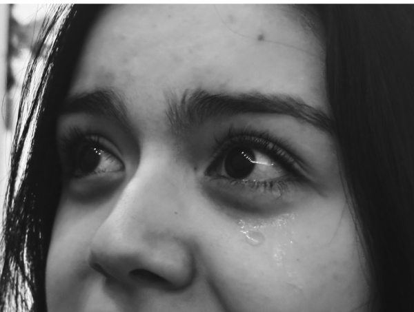 Melanie Rodriguez- Diaz cries at Neshaminy High School on March 2, 2026. Overwhelmed by the pressure of constant tests and the fear of failing, the stress of academic expectations finally becomes too much to hold in. (The Playwickian / Brianna Smith)