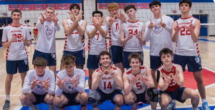 NHS Boys Varsity Volleyball Team in gym 3 of NHS celebrating a win against Haverford. (In courtesy of the NHS boys varsity volleyball team/The Playwickian)