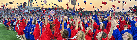 Class of 2025 throwing caps in the air at their graduation ceremony at the Harry E. Franks Stadium at NHS, in June 2025. Photo via neshaminy.org
